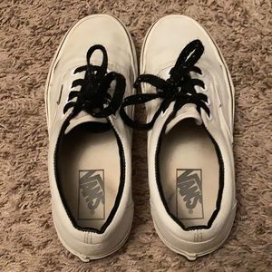 Broken in white vans